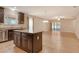 Open-concept kitchen featuring a center island, granite countertops, and tile flooring at 27854 Arrowhead Cir, Punta Gorda, FL 33982