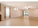 Open living space featuring tile floors and views of a screened patio at 27854 Arrowhead Cir, Punta Gorda, FL 33982