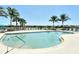 Take a dip in the clear blue community pool with plenty of lounge chairs and tables for relaxing at 27854 Arrowhead Cir, Punta Gorda, FL 33982