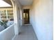 Inviting entrance with tiled flooring and decorative archways leading into the home at 296 Milford St, Port Charlotte, FL 33953
