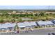 Aerial view of the community townhomes with screened lanais and ample parking spaces at 3300 Loveland Blvd # 2801, Punta Gorda, FL 33980