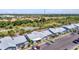 Community aerial view of the townhomes with solar panels and convenient parking spaces at 3300 Loveland Blvd # 2801, Punta Gorda, FL 33980