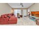 Inviting living room featuring a comfortable sectional sofa and neutral color palette at 3300 Loveland Blvd # 2801, Punta Gorda, FL 33980