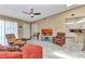 Bright living space featuring tile flooring, a comfortable sofa and easy access to the kitchen at 3300 Loveland Blvd # 2801, Punta Gorda, FL 33980