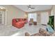 Inviting living room featuring a comfortable sectional sofa and neutral color palette at 3300 Loveland Blvd # 2801, Punta Gorda, FL 33980