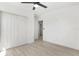 Bedroom with a ceiling fan, closet and tile floor at 3315 Elkcam Blvd, Port Charlotte, FL 33952