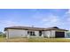 A beautifully renovated single-story home featuring a bright exterior and dark trim at 3315 Elkcam Blvd, Port Charlotte, FL 33952