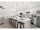 Modern kitchen with a large island, seating, and stainless steel appliances at 3315 Elkcam Blvd, Port Charlotte, FL 33952