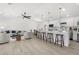 Open-concept living space with a spacious kitchen, dining area, and comfortable seating arrangement at 3315 Elkcam Blvd, Port Charlotte, FL 33952