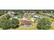 Aerial view of a residential area featuring well-maintained homes and a community swimming pool at 347 Casale G St, Punta Gorda, FL 33983