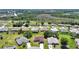 Residential neighborhood with tree coverage, well-maintained homes, and green lawns on a sunny day at 347 Casale G St, Punta Gorda, FL 33983