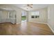 Dining area with white cabinets and a sliding glass door to the lanai and pool at 347 Casale G St, Punta Gorda, FL 33983