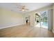Bright living room with sliding glass doors that overlook the lanai/pool at 347 Casale G St, Punta Gorda, FL 33983