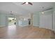 Open-concept living space with sliding glass doors, seamlessly connecting indoor and outdoor living areas at 347 Casale G St, Punta Gorda, FL 33983