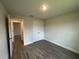 Bedroom with closet and wood-look tile flooring at 411 Paramaribo St, Punta Gorda, FL 33983