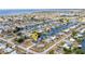 Aerial view of a waterfront neighborhood with canals, boat docks, and single-Gathering homes at 4213 Gardner Dr, Port Charlotte, FL 33952