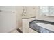 Beautiful bathroom featuring a standalone shower and a soaking tub with elegant granite countertops at 4213 Gardner Dr, Port Charlotte, FL 33952