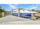 A large boat is moored to a dock, ready for nautical adventures at 4213 Gardner Dr, Port Charlotte, FL 33952