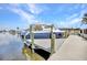 This boat is docked and ready to go out on the canal at 4213 Gardner Dr, Port Charlotte, FL 33952