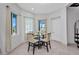 Bright dining area with natural light, comfortable seating, and neutral tones at 4213 Gardner Dr, Port Charlotte, FL 33952