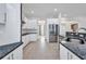 Open concept kitchen featuring stainless steel appliances and plenty of cabinet space at 4213 Gardner Dr, Port Charlotte, FL 33952