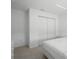 Bedroom with carpet and one closet to store personal belongings at 5800 Sabal Trace Dr # 1302, North Port, FL 34287
