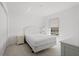 Bedroom with carpet and one window to let in natural light at 5800 Sabal Trace Dr # 1302, North Port, FL 34287