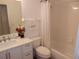 Bright bathroom featuring a shower-tub combination at 582 Reading Nw St, Port Charlotte, FL 33952