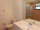 Bathroom with a modern vanity, faucet and a shower with glass door at 582 Reading Nw St, Port Charlotte, FL 33952