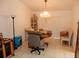 Bright dining room with a chandelier and lots of natural light at 582 Reading Nw St, Port Charlotte, FL 33952