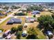 Aerial view showcasing the property's location and surrounding neighborhood including its charming backyard at 582 Ridgewood Nw St, Port Charlotte, FL 33952