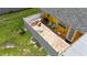 Aerial view of the backyard patio with pavers, outdoor furniture, and privacy fence, perfect for relaxation at 582 Ridgewood Nw St, Port Charlotte, FL 33952