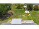 Aerial view of the backyard featuring a shed and a patio, highlighting the outdoor space at 582 Ridgewood Nw St, Port Charlotte, FL 33952