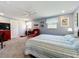 Spacious bedroom with neutral carpet and walls, offering a cozy and inviting atmosphere at 582 Ridgewood Nw St, Port Charlotte, FL 33952