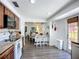 Cozy kitchen with a view into the dining area, complemented by modern appliances and stylish finishes at 582 Ridgewood Nw St, Port Charlotte, FL 33952