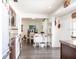 The kitchen features bar seating and stainless appliances overlooking the dining area at 582 Ridgewood Nw St, Port Charlotte, FL 33952