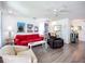 Inviting living room with neutral walls, modern furniture, and warm lighting, creating a cozy atmosphere at 582 Ridgewood Nw St, Port Charlotte, FL 33952