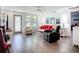 Comfortable living room with stylish seating, modern flooring, and bright natural light at 582 Ridgewood Nw St, Port Charlotte, FL 33952