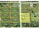 Aerial view of parcel with yellow highlight showing boundaries at 6308 Grove Blvd, Punta Gorda, FL 33982