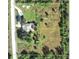 A beautiful aerial view of the property and surrounding area, showcasing the home's location and expansive grounds at 6308 Grove Blvd, Punta Gorda, FL 33982