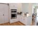 Modern kitchen with stainless steel appliances and lots of pantry space at 6308 Grove Blvd, Punta Gorda, FL 33982