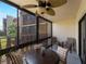 Enclosed patio with comfortable seating and views, perfect for relaxing and enjoying the outdoors at 72 Boundary Blvd # 226, Rotonda West, FL 33947