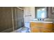 Bathroom with shower and tub combination, vanity, tile walls and flooring at 730 Boundary Blvd, Rotonda West, FL 33947
