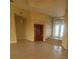 Inviting foyer featuring tiled flooring and decorative doors with glass inserts at 730 Boundary Blvd, Rotonda West, FL 33947
