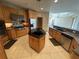 Well-appointed kitchen featuring granite countertops, stainless steel appliances, and ample cabinet space at 730 Boundary Blvd, Rotonda West, FL 33947