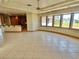 Spacious living room with tile floors and windows at 730 Boundary Blvd, Rotonda West, FL 33947