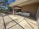 Covered outdoor kitchen with built-in grill and countertop space, perfect for entertaining at 730 Boundary Blvd, Rotonda West, FL 33947