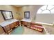 Bright bathroom featuring dual vanities, decorative accents, and a window letting in natural light at 10203 Windsong Rd, Punta Gorda, FL 33955