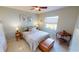 Cozy bedroom with a comfortable bed, bedside tables, and a bright window at 10203 Windsong Rd, Punta Gorda, FL 33955