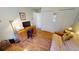 Bedroom with a desk, futon, and closet for a versatile space at 10203 Windsong Rd, Punta Gorda, FL 33955